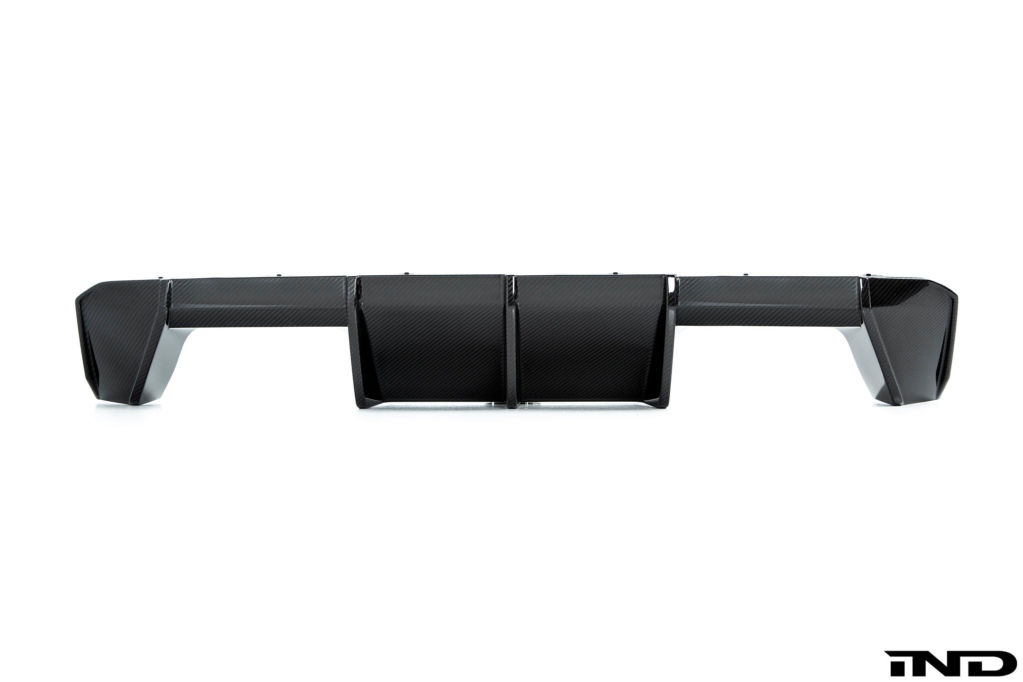 BMW M Performance G8X M3/M4 carbon rear diffuser showcasing sleek design and aerodynamic features for enhanced exterior styling.