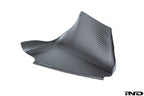 Close-up view of the matte carbon scoop from the Eventuri's E9X M3 carbon intake system on a white background