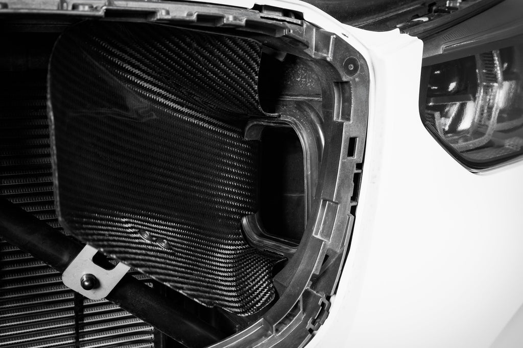 Eventuri carbon intake system installed BMW X3M X4M S58 engine bay