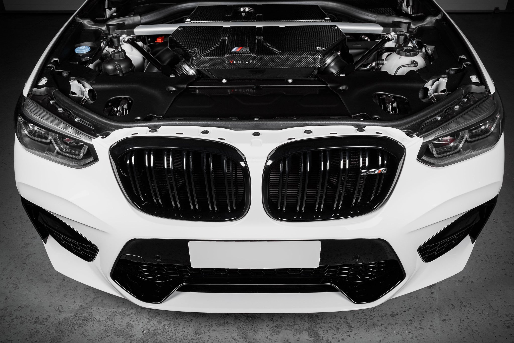 Eventuri carbon intake system installed BMW X3M X4M S58 engine bay