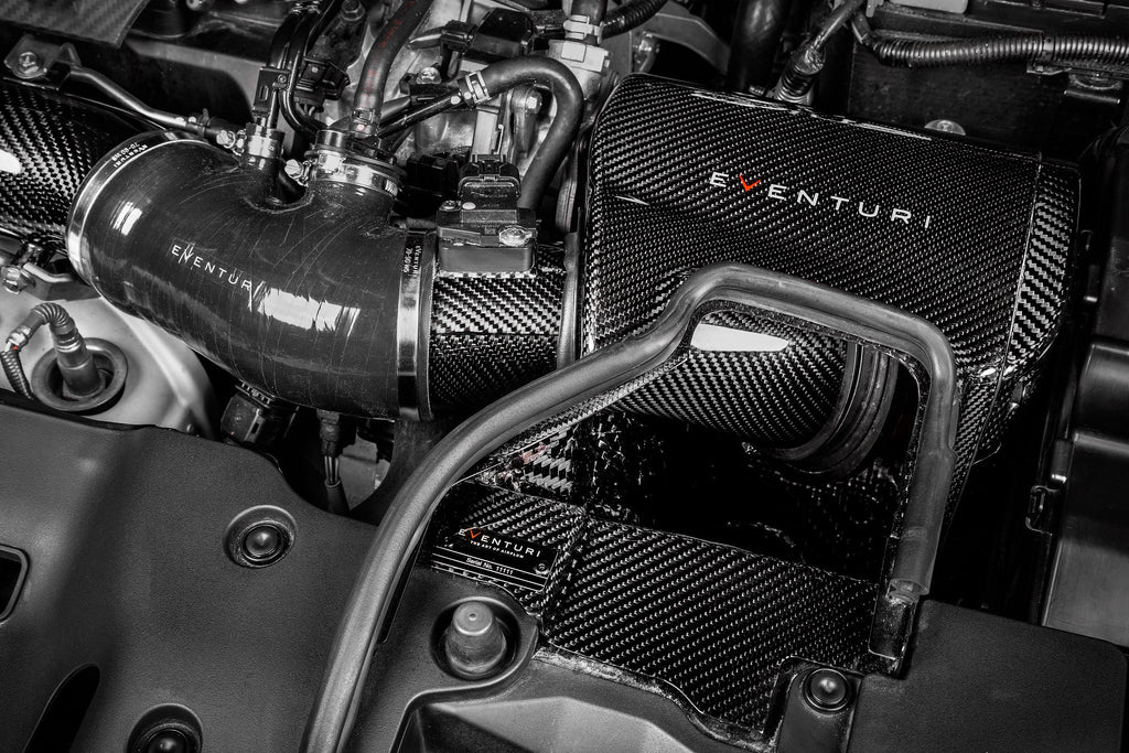 Eventuri FK8 Civic Type-R Black Carbon Intake System V2 with filter housing installed, showcasing sleek performance air intake.