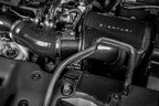 Eventuri FK8 Civic Type-R Black Carbon Intake System V2 with filter housing installed, showcasing sleek performance air intake.