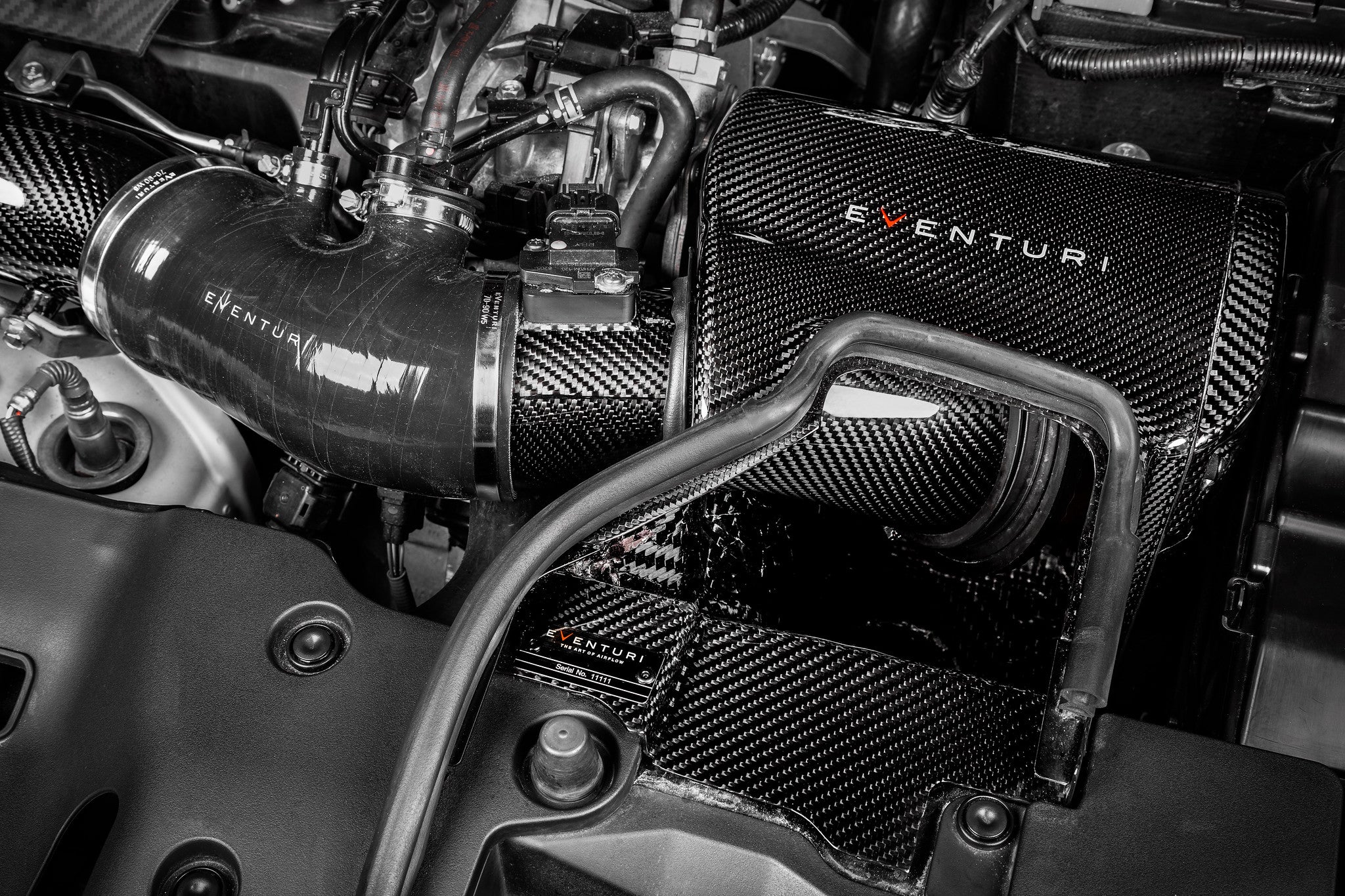 Eventuri FK8 Civic Type-R Black Carbon Intake System V2 with filter housing installed, showcasing sleek performance air intake.