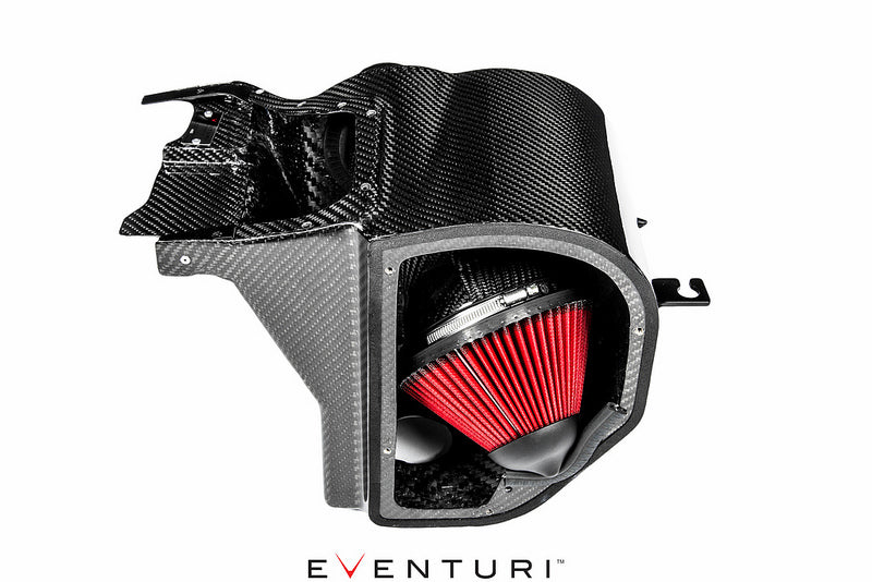 View of the carbon fiber air filter housing of the Eventuri FK8 Civic Type-R intake system highlighting air filter positioning against a white background.