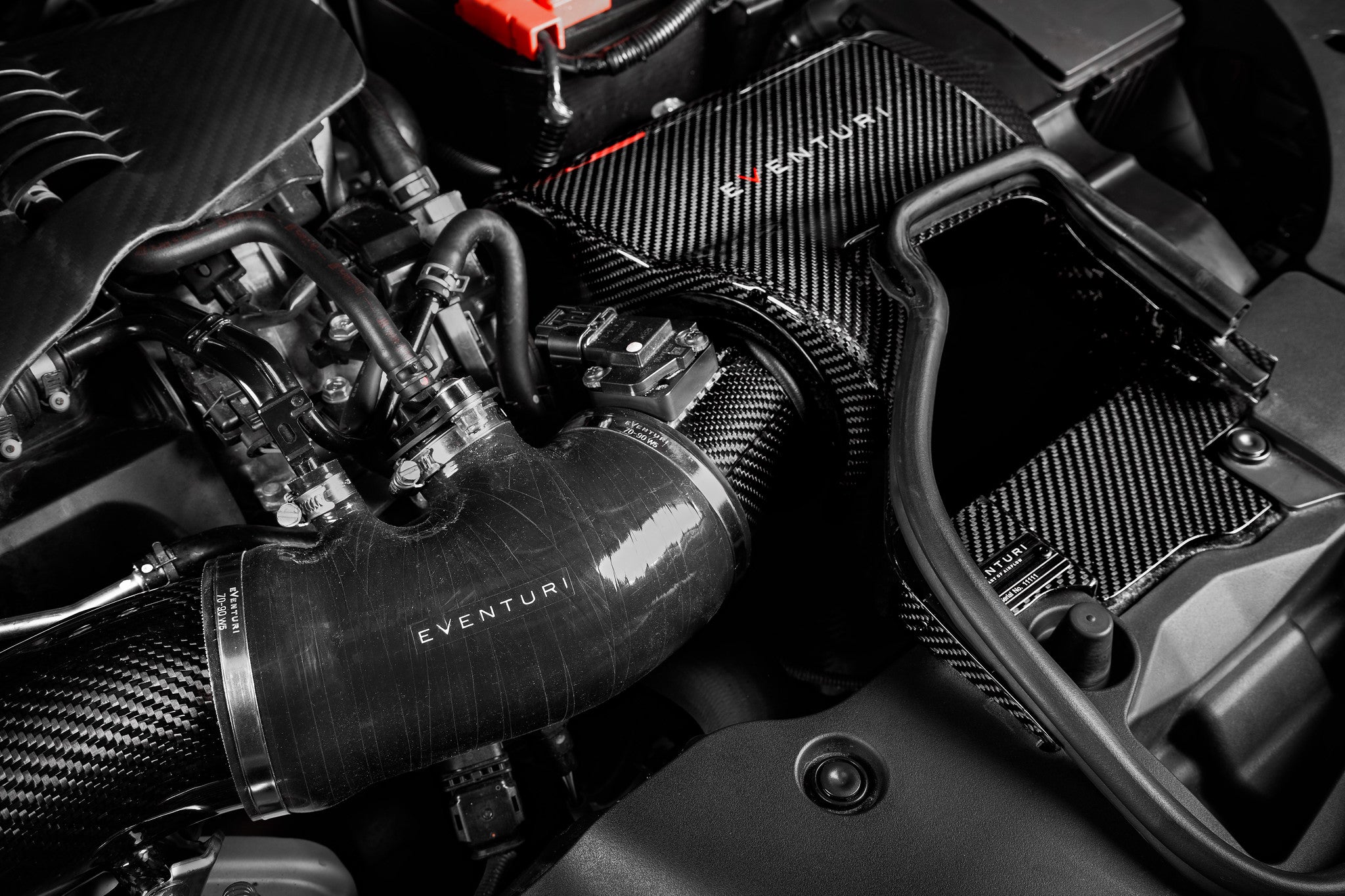Eventuri FK8 Civic Type-R black carbon intake system with silicone hoses, showcasing the performance air intake installed.