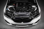 Eventuri BMW G20 3-Series B48 black carbon intake system installed, showcasing performance air intake for enhanced engine airflow.