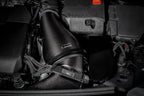 Eventuri black carbon intake system installed on Mercedes AMG A45 and CLA45, showcasing performance enhancement and sleek design.