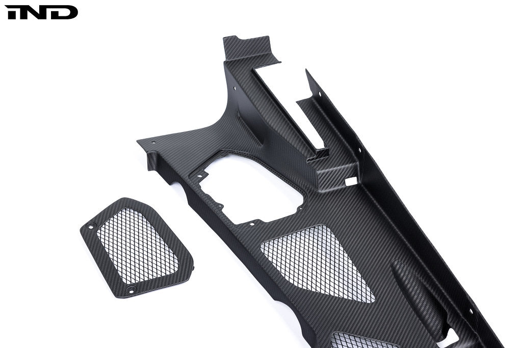 Close-up of black carbon engine cover set by Eventuri on a Lamborghini Huracan, showcasing the sleek, performance-focused design.