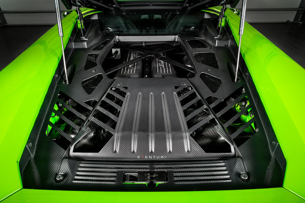 Eventuri Lamborghini Huracan black carbon engine cover set installed, showcasing performance car engine bay with sleek carbon details.