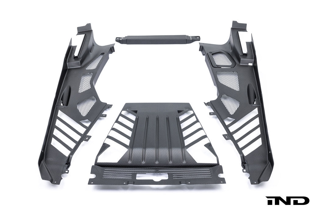 Eventuri Lamborghini Huracan black carbon engine cover set installed in engine bay, showcasing sleek performance design.