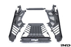 Eventuri Lamborghini Huracan black carbon engine cover set installed in engine bay, showcasing sleek performance design.