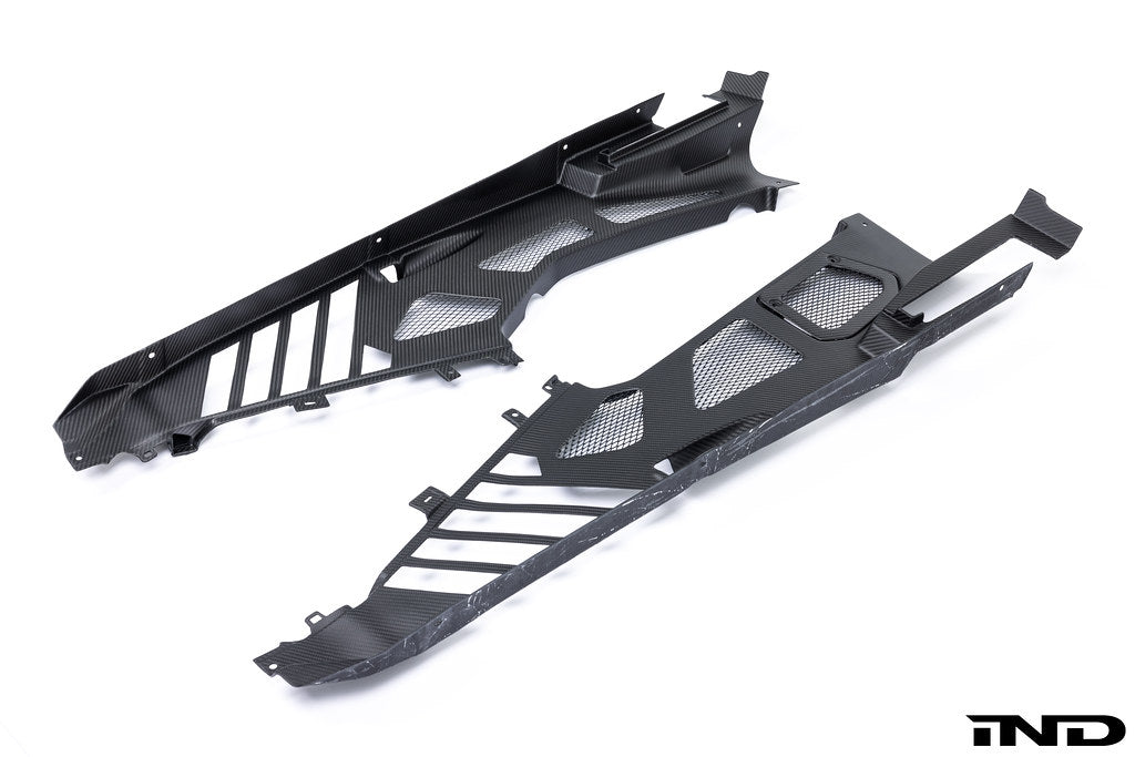 Eventuri Lamborghini Huracan black carbon engine cover set showing side panels and detailed carbon fiber finish.