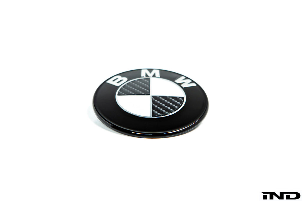 IND Carbon BMW Roundel Set for exterior use, featuring sleek carbon design with iconic BMW logo embellishments.