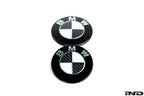 IND Carbon BMW Roundel Set for exterior of vehicle, featuring sleek carbon-fiber finish with iconic BMW logo design.