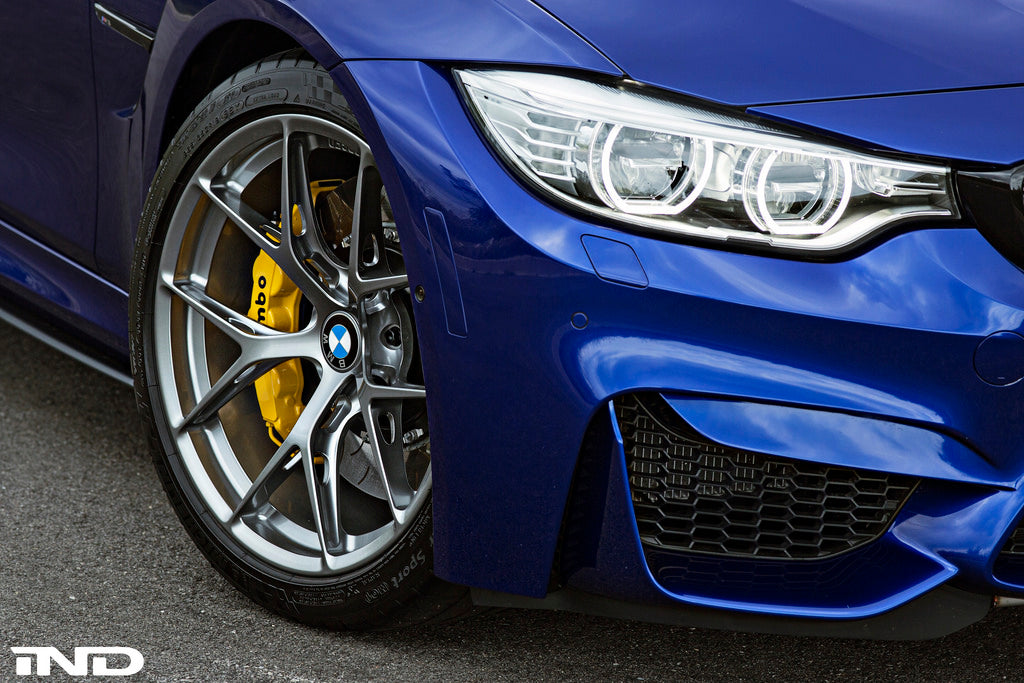 IND painted front reflector set for BMW F8X M3 M4 exterior, showcasing sleek design and high-quality finish.