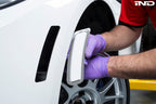 IND F8X M3 M4 painted front reflector set installed on exterior of BMW F8X M3 and M4 models, showcasing sleek design.