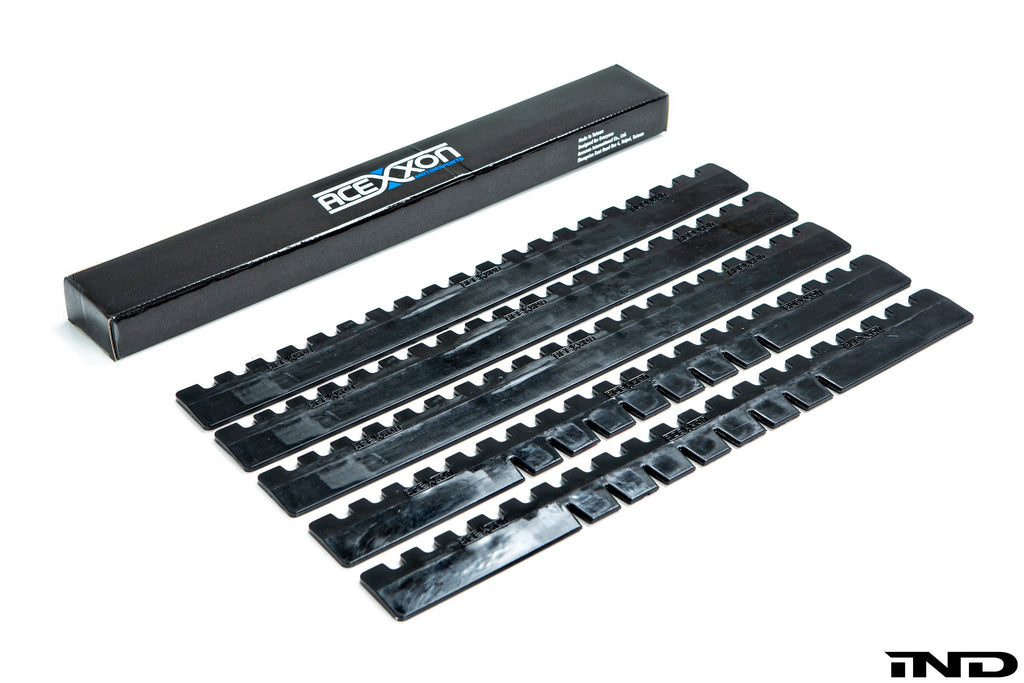 Acexxon Heavy Duty Universal Lip Protector kit with five exterior white protective strips for vehicle front lips.