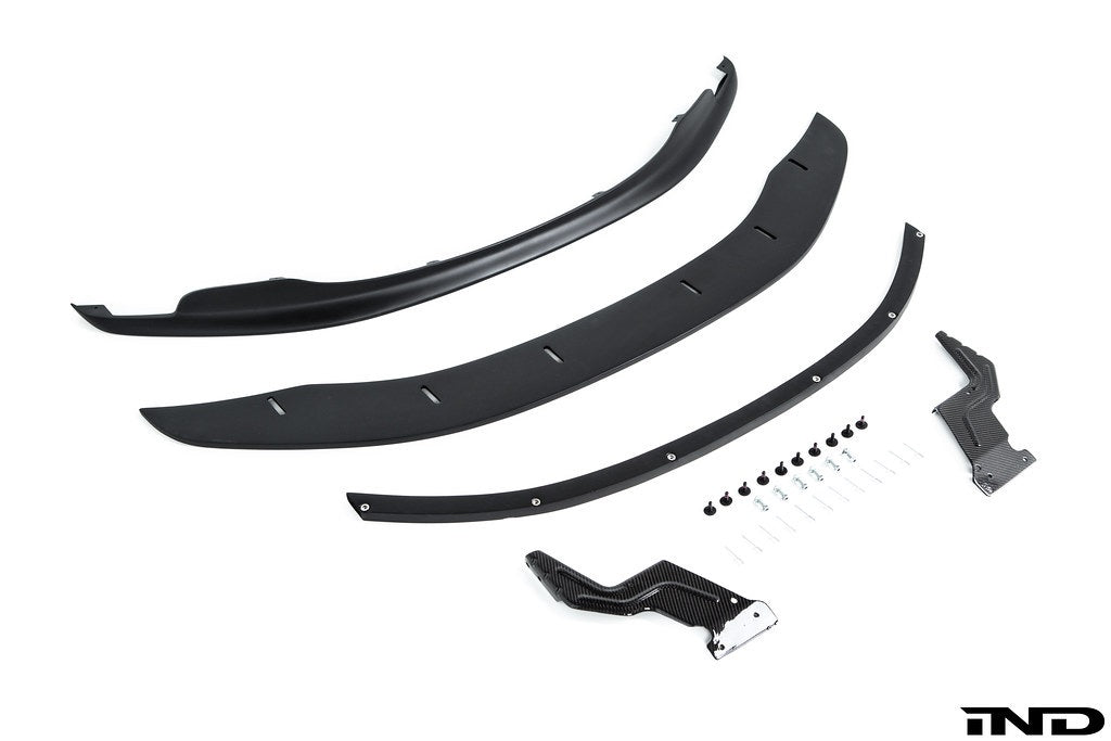 Alpha N BMW E9X M3 GTS front lip splitter in white, adjustable exterior car accessory for enhanced aerodynamics and sporty look.