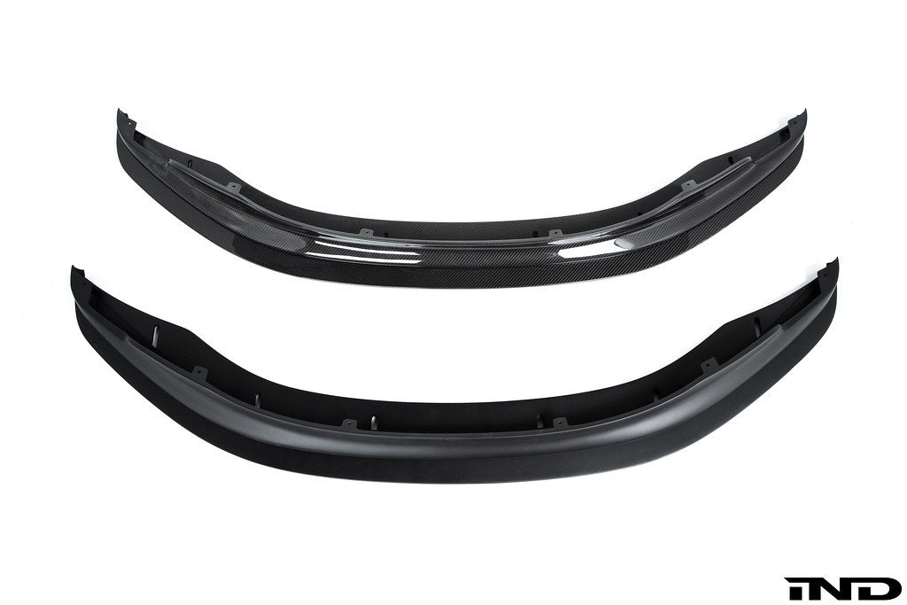 Alpha N E9X M3 GTS front lip in white, showcasing sleek design and adjustable splitter for enhanced exterior styling.