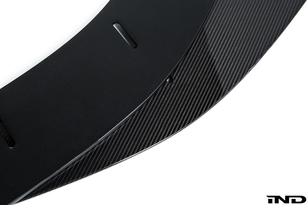 Alpha N BMW E9X M3 GTS front lip splitter in white, adjustable exterior car accessory with aerodynamic design.