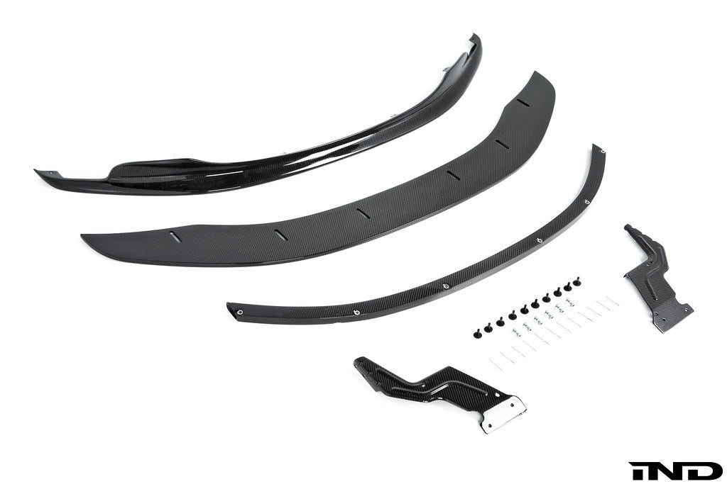 Alpha N BMW E9X M3 GTS front lip splitter, white exterior car accessory with adjustable design, enhancing sporty look and aerodynamics.