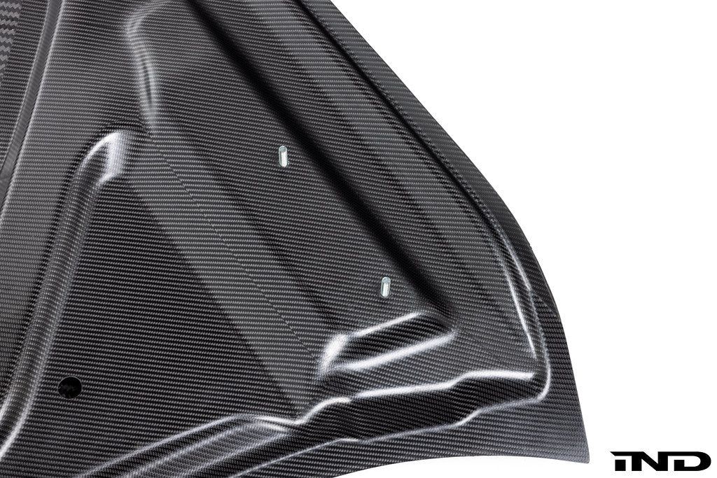 Alpha N G8X M3 M4 carbon fiber vented hood with raw finish, showcasing its lightweight, aerodynamic exterior design.