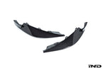 Alpha N G8X M3 M4 carbon front corner splitter set installed on vehicle, showing sleek white finish and aerodynamic design.