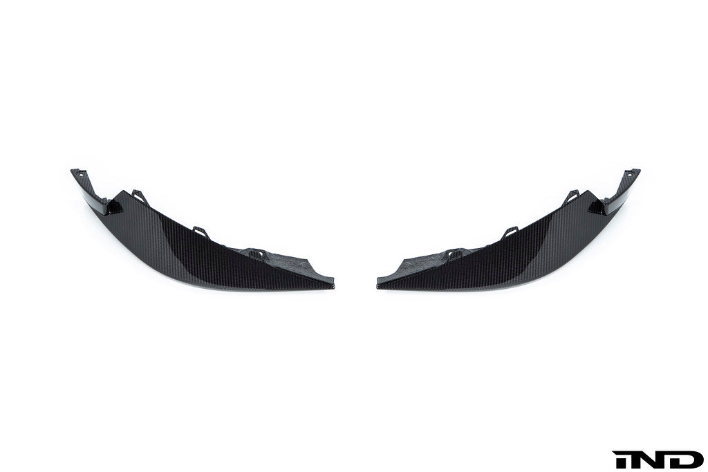 Alpha N G8X M3 M4 Carbon Front Corner Splitter Set installed on vehicle, showcasing sleek white exterior design and aerodynamic features.