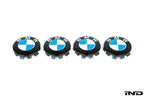 IND Gloss Black Wheel Center Cap Set for BMW, 56mm, with a sleek shiny finish on a white background.