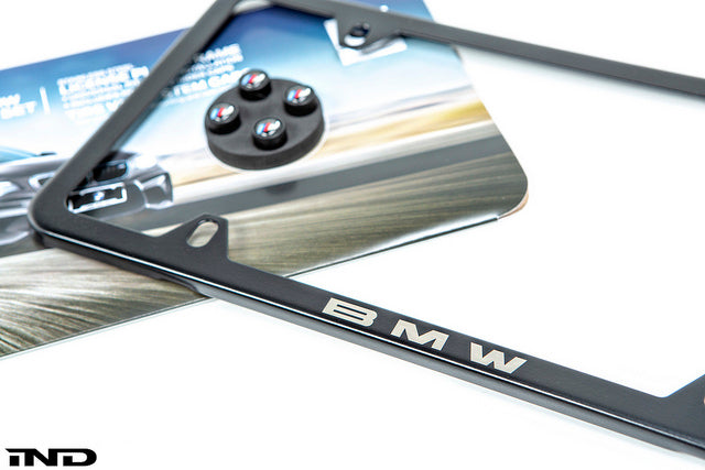 BMW black slimline license plate frame and black m logo valve stem caps - iND Distribution