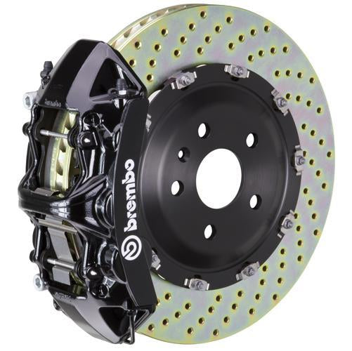 Brembo F8X M2 M3 M4 GT Big Brake Kit with 380x34mm 2-piece drilled front brake rotors and black calipers.