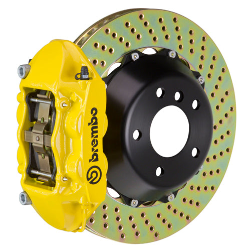Yellow Brembo F8X M2/M3/M4 GT big brake kit with 2-piece 345x28mm drilled rear calipers and 4-piston design.