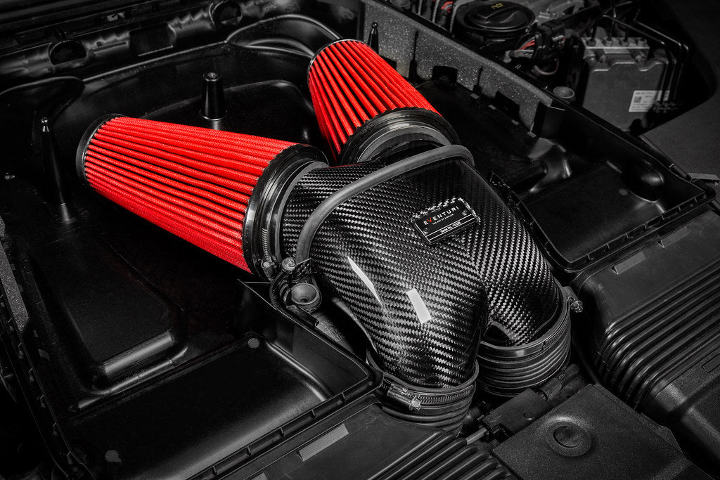 Eventuri 4.0TFSI Twin Turbo V8 black carbon intake system showing sleek carbon fiber components and twin turbo connections.