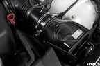 Eventuri carbon fiber intake installed in the engine bay of a BMW E46 M3
