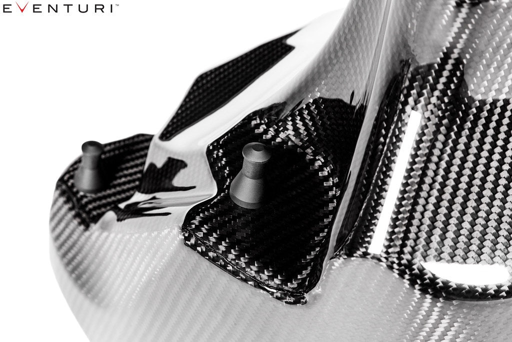 Close-up of Eventuri G20 B48 carbon airbox showing mounting pegs