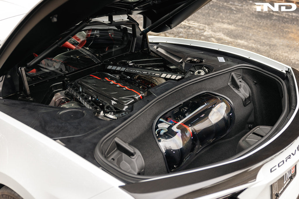 Eventuri carbon fiber intake system installed in a Chevrolet C8 Corvette Coupe with clear trunk panel