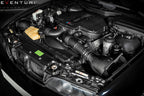 Side view of Eventuri BMW E39 M5 carbon intake system installed in engine bay