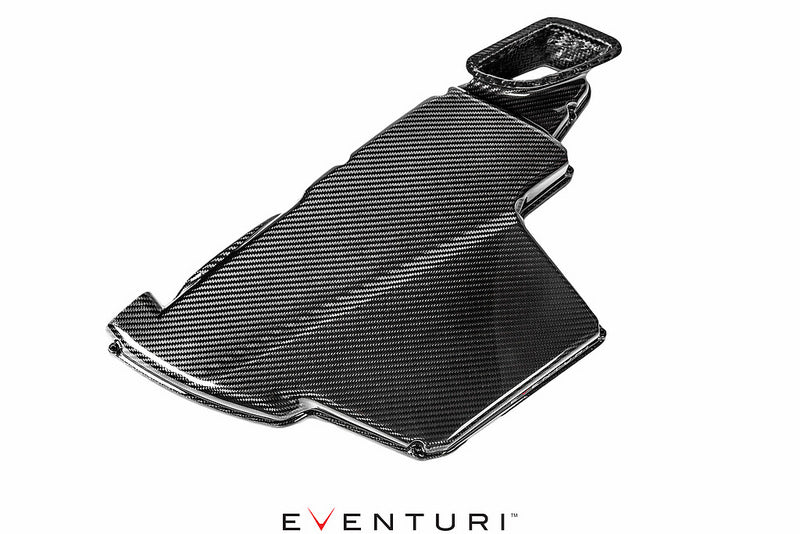 Eventuri black gloss carbon airbox lid for BMW E9X M3 S65 engine, showcasing a sleek performance upgrade.