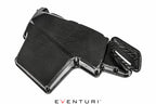 Eventuri black gloss carbon airbox lid for BMW E9X M3 S65 engine, showcasing a sleek, high-performance automotive component.