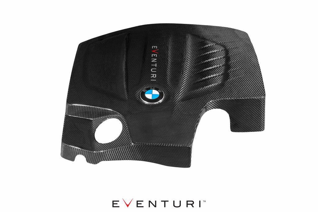 Black carbon engine cover for BMW F-Chassis with N55 engine, designed by Eventuri, showcasing a sleek performance upgrade.