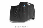 Eventuri black carbon engine cover for BMW F-Chassis N55, performance car engine upgrade with sleek rear view.