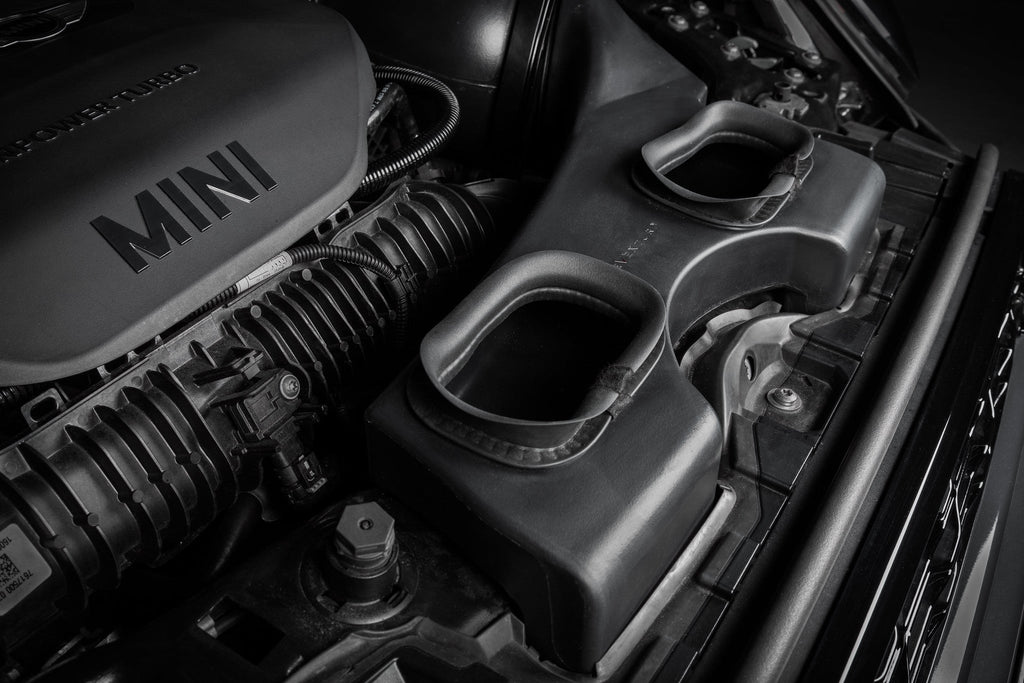Eventuri F56 Mini Cooper S plastic intake with carbon scoop installed in engine bay, showcasing performance car components.