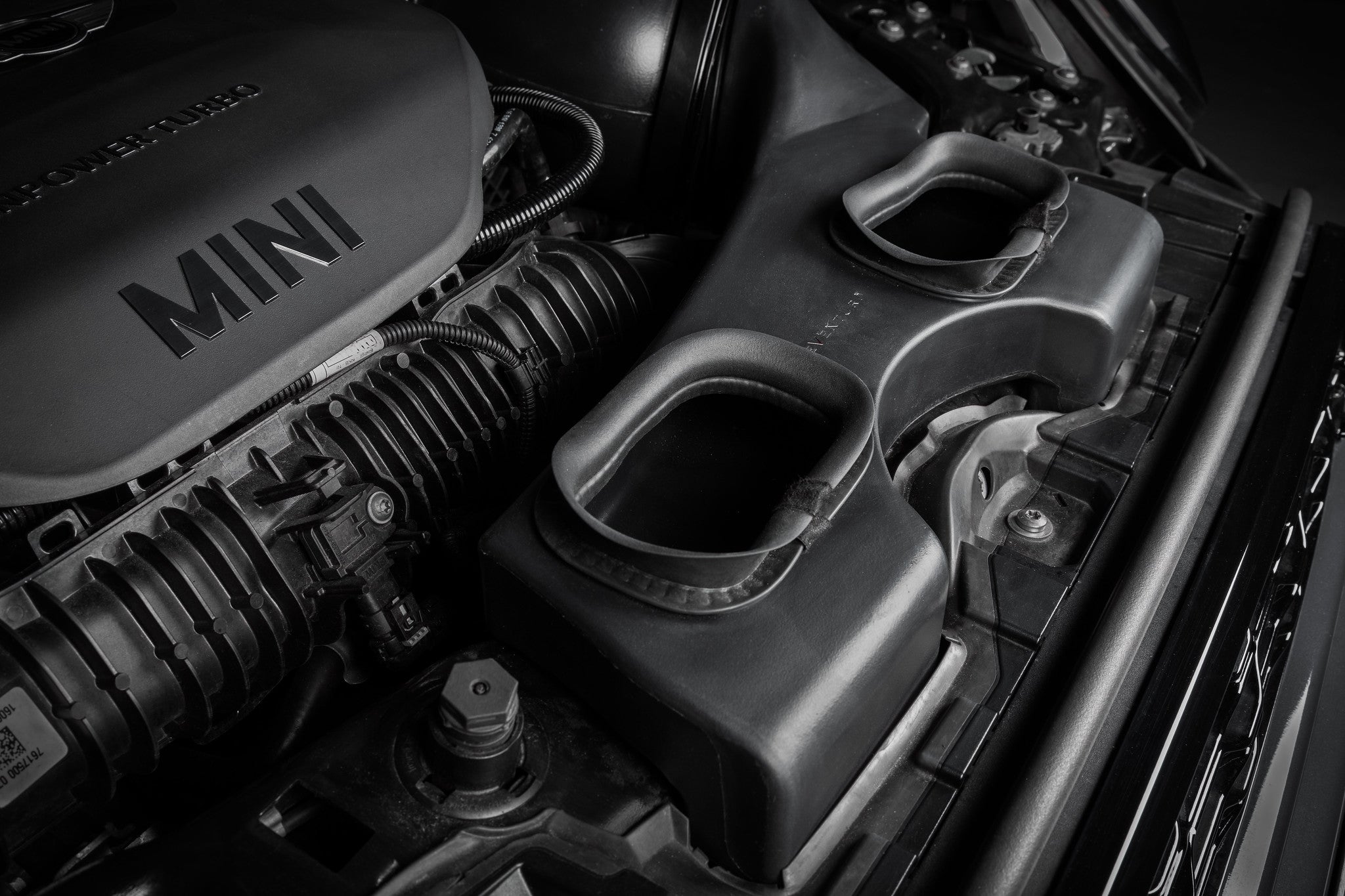 Eventuri F56 Mini Cooper S plastic intake with carbon scoop installed in engine bay, showcasing performance car components.