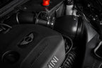 Eventuri F56 Mini Cooper S plastic intake with carbon scoop installed in engine bay, showcasing performance upgrade components.