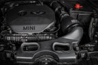 Eventuri F56 Mini Cooper S plastic intake with carbon scoop installed in engine bay, enhancing performance and airflow.