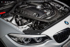 Eventuri black carbon intake system installed on BMW F87 M2 Competition and M2 CS, showcasing performance automotive parts.