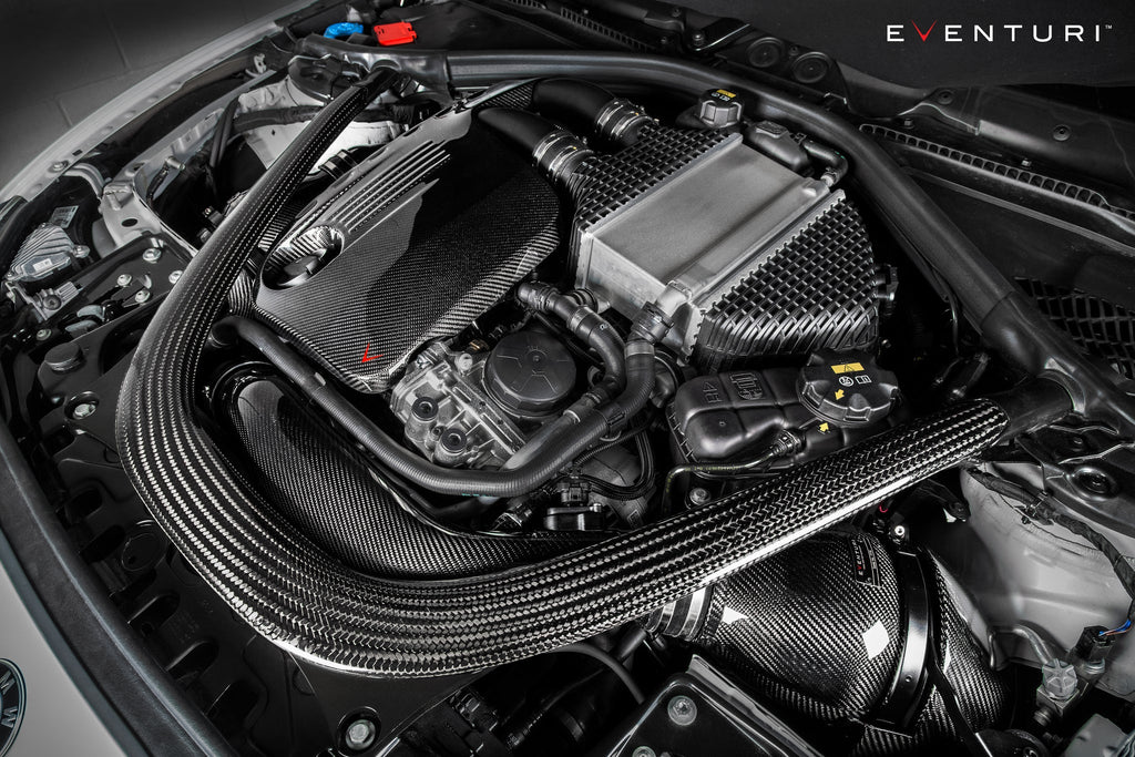 Eventuri black carbon intake system installed on BMW F87 M2 Competition and M2 CS, showcasing performance air intake.