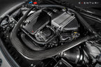 Eventuri black carbon intake system installed on BMW F87 M2 Competition and M2 CS, showcasing performance air intake.