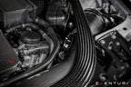 Eventuri black carbon intake system installed on BMW F87 M2 Competition and M2 CS, showcasing performance engine components.