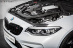 Eventuri black carbon intake system installed on BMW F87 M2 Competition and M2 CS, showcasing performance air intake design.
